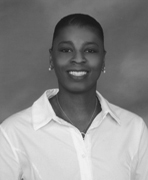 A black and white photo of a woman in a white shirt.