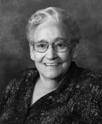 A black and white photo of an older woman.