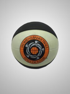 An orange and black basketball ball with a logo on it.