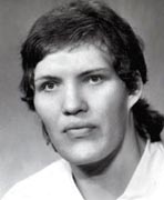 A black and white photo of a young man.