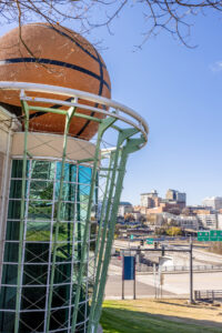 A basketball ball sitting atop a building, possibly signifying a potential hall of fame donation.