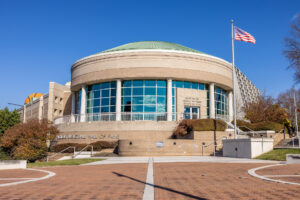 A building with a circular roof.